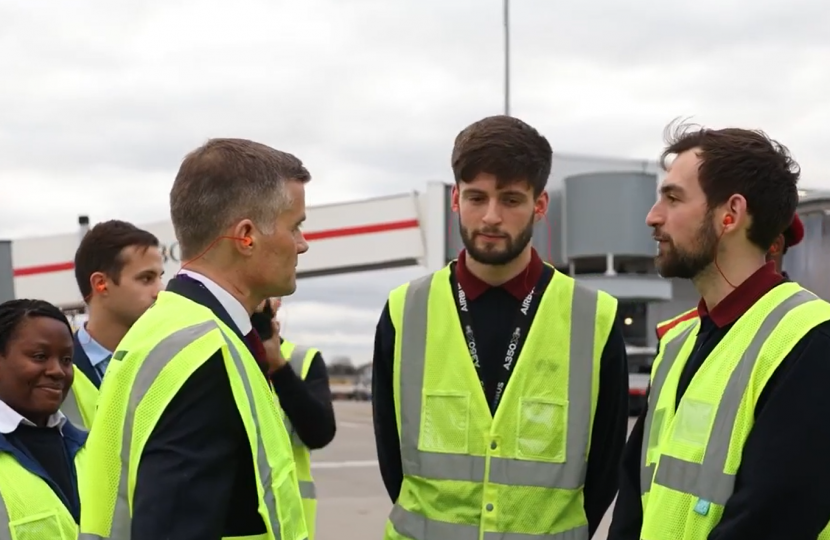 Mark Harper talking to apprentices at Heathrow